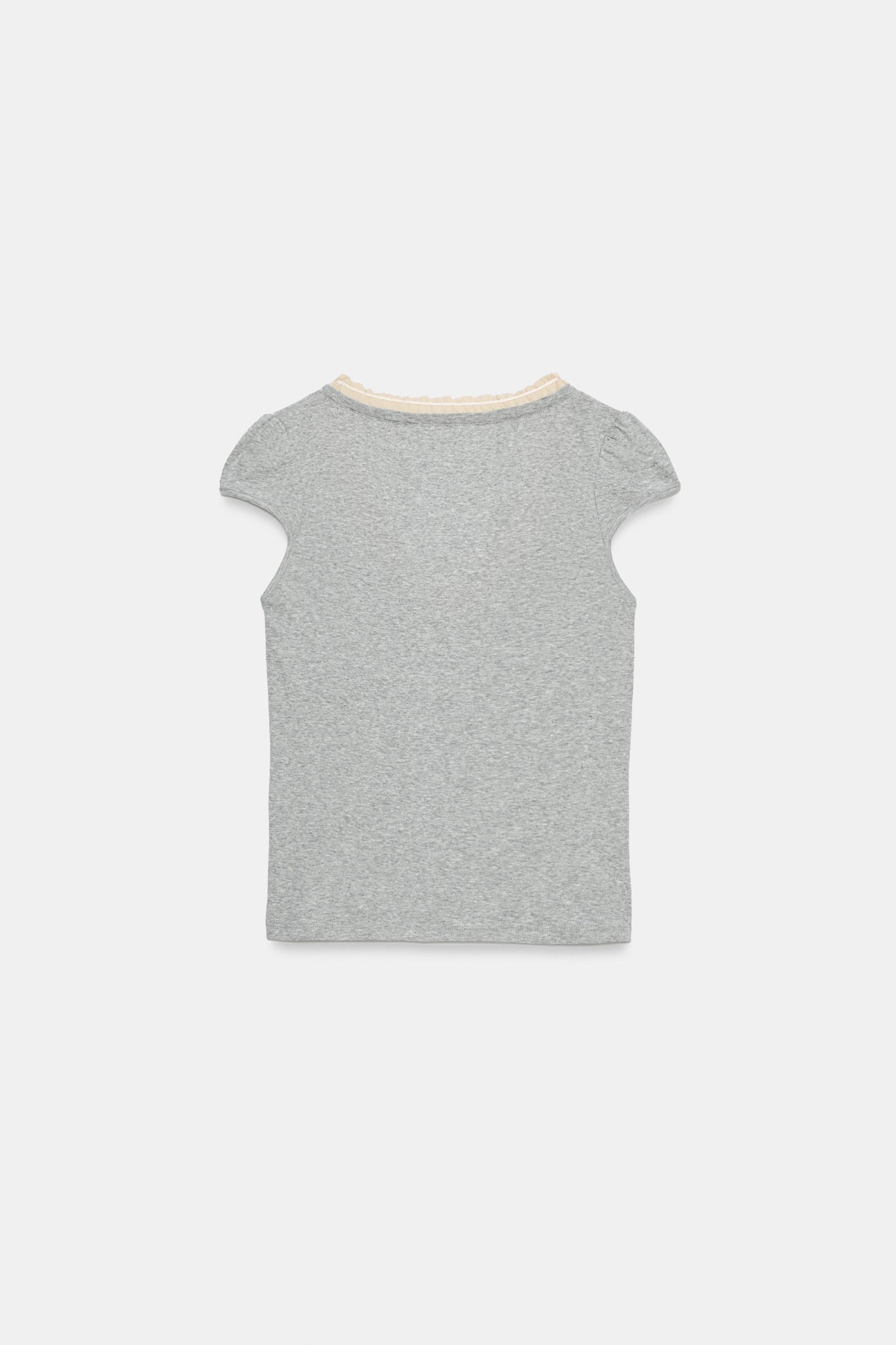T-SHIRT EN MATIÈRES VARIÉES À COL V